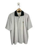 Polo homme Camel blanc chiné col vert foncé contrastant, logo Camel brodé, manches courtes, taille L, vue de face